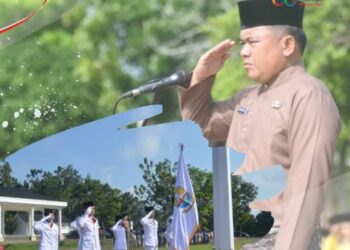 Sekda Budhi Hartono Pimpin Upacara HUT Provinsi ke-66 di Lapangan BCK Sengeti.
