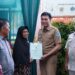 Bupati Fadhil Serahkan 58 Sertifikat